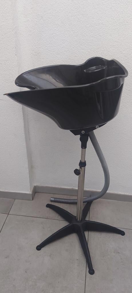 Wasbak voor kapper, Ophalen