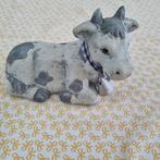 Beeldje koe., Ophalen