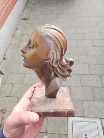 kunstwerk brons hoofd op marmer beschikbaar voor biedingen
