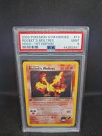 Rocket's Moltres Holo 1st Edition Gym Heroes PSA 9, Hobby en Vrije tijd, Verzamelkaartspellen | Pokémon, Ophalen of Verzenden