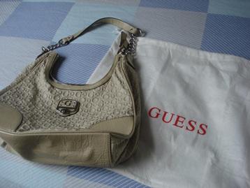 Guess handtas + stofzak beschikbaar voor biedingen
