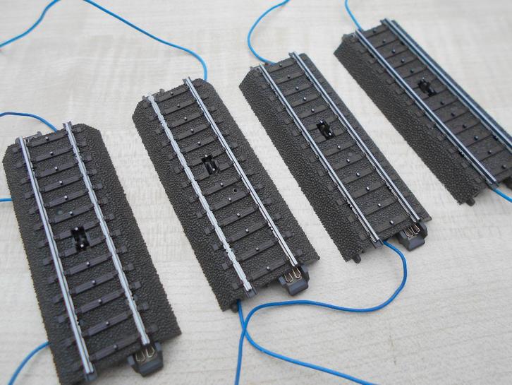 lot met 4 stuks marklin 24994 schakelrails, Hobby en Vrije tijd, Modeltreinen | H0, Zo goed als nieuw, Rails, Wisselstroom, Märklin