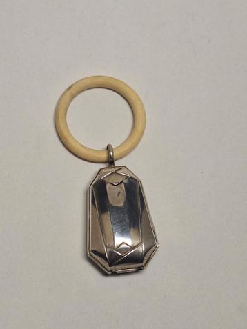 Antiek zilveren Art Deco rammelaar beschikbaar voor biedingen