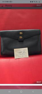 Tas delvaux, Ophalen