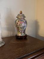 Genummerde Chinese vaas, Ophalen