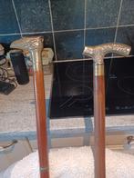 2 wandelstokken, Ophalen