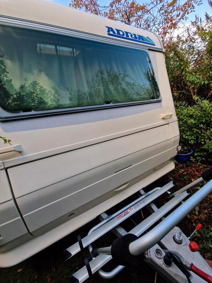Caravane Adria Unica 462, Caravans en Kamperen, Caravans, Particulier, Adria, Vast bed, Douche, Fietsenrek, Luifel, Mover, Uitbouw voortent