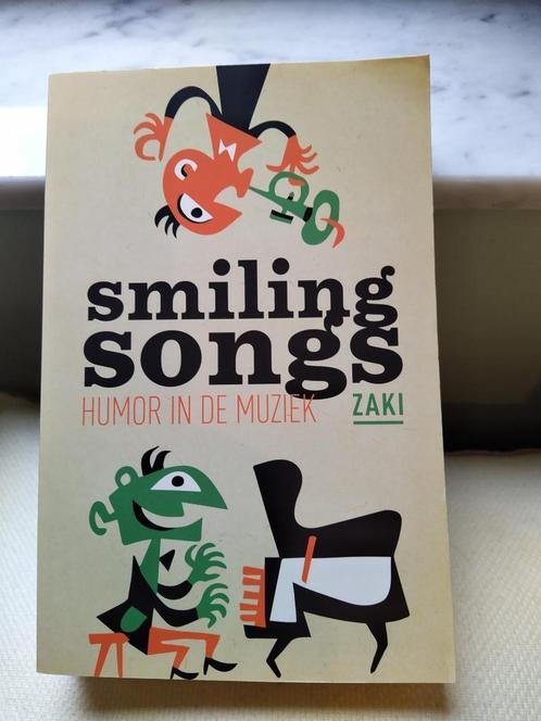 Smiling songs (Humor in muziek) - Zaki, Livres, Humour, Comme neuf, Enlèvement ou Envoi