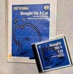 Jill Trinka - Bought me a cat - VOLUME 2 - Boek + CD nieuw, Ophalen of Verzenden, Nieuw in verpakking, Muziek