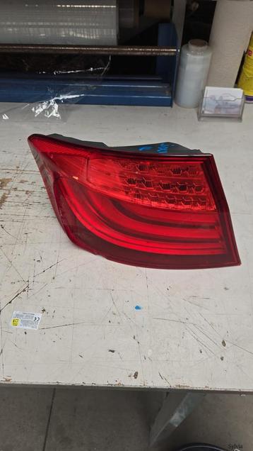 Achterlicht links op scherm BMW 5 Serie F10 63217203229 7203 beschikbaar voor biedingen