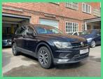 Volkswagen Tiguan 1.4 TSI ACT Comfortline, Auto's, Volkswagen, Stof, 4 cilinders, Zwart, Bedrijf