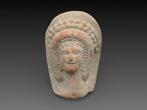 Tête en terre cuite de divinité, terre cuite, époque romaine, Enlèvement ou Envoi