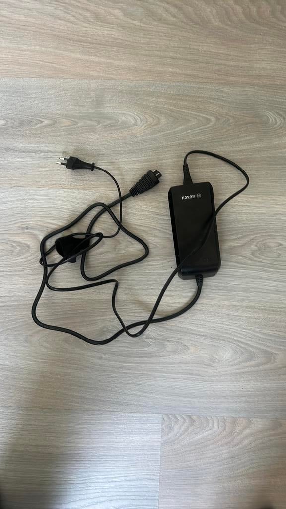 Bosch fietsen accu oplader, Fietsen en Brommers, Ophalen, Zo goed als nieuw