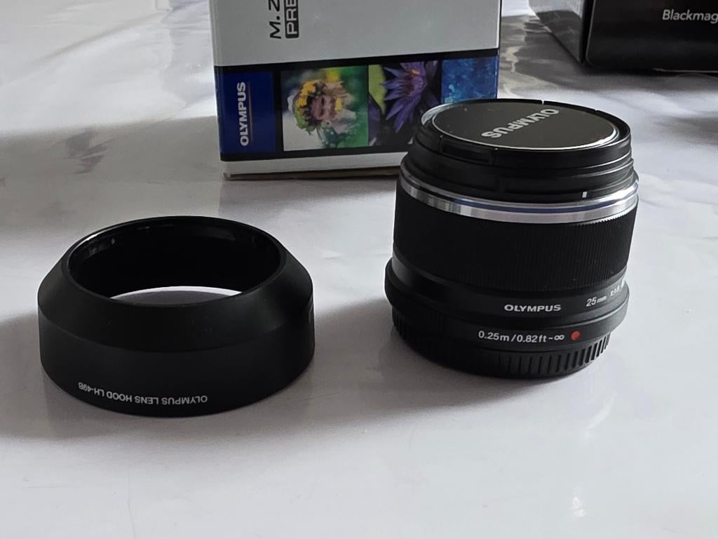 Olympus 25mm 1.8 en excellent état., Ophalen of Verzenden, Zo goed als nieuw