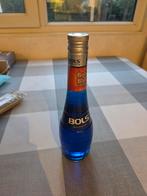 Gesloten fles blue caracao van Bols, Ophalen