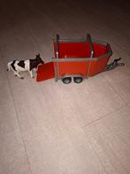 Bruder veetransportaanhanger met 1 koe, Ophalen