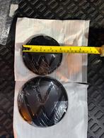 Zwarte hoes met VW-logo, Ophalen