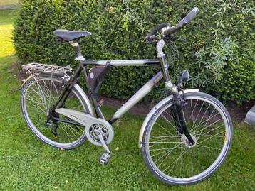 Heren trekkingfiets in zeer goede staat beschikbaar voor biedingen