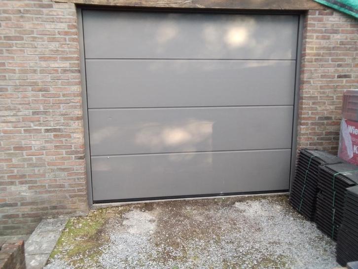 4 panneaux de porte de garage gris, Doe-het-zelf en Bouw, Deuren en Vliegenramen, Zo goed als nieuw, Garagedeur, Ophalen