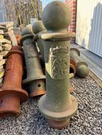 Verschillende oude gietijzeren palen, Ophalen