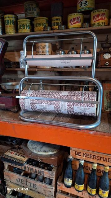 Ancienne boutique textile à dérouleur de papier, Enlèvement