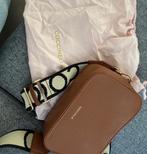 Schoudertas, Ophalen