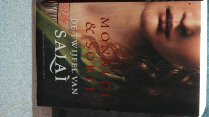 Rita Monaldi - De twijfel van Salai, Boeken, Thrillers, Zo goed als nieuw, Ophalen of Verzenden