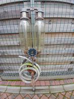 Antieke benzinepomp, Ophalen