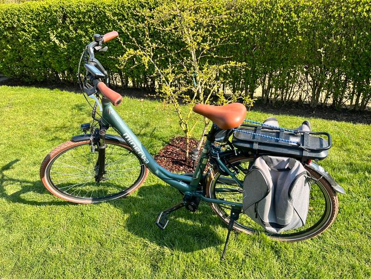 Elektrische damesfiets Minerva, Fietsen en Brommers, Elektrische fietsen, Gebruikt, Overige merken, 30 tot 50 km per accu, Ophalen