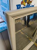 Wandspiegel, Ophalen