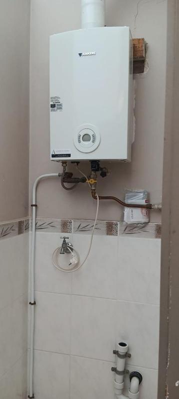 Doorstromer Junkers- gaseiser beschikbaar voor biedingen