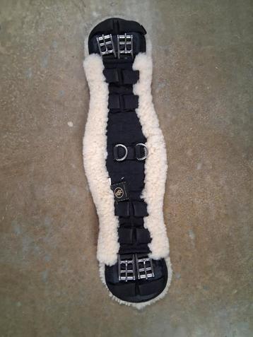Dressuursingel met bont 55cm beschikbaar voor biedingen