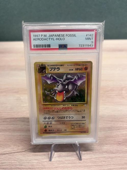 Aerodactyl Holo PSA 9 - #142 - Fossile japonais, Hobby & Loisirs créatifs, Jeux de cartes à collectionner | Pokémon, Comme neuf