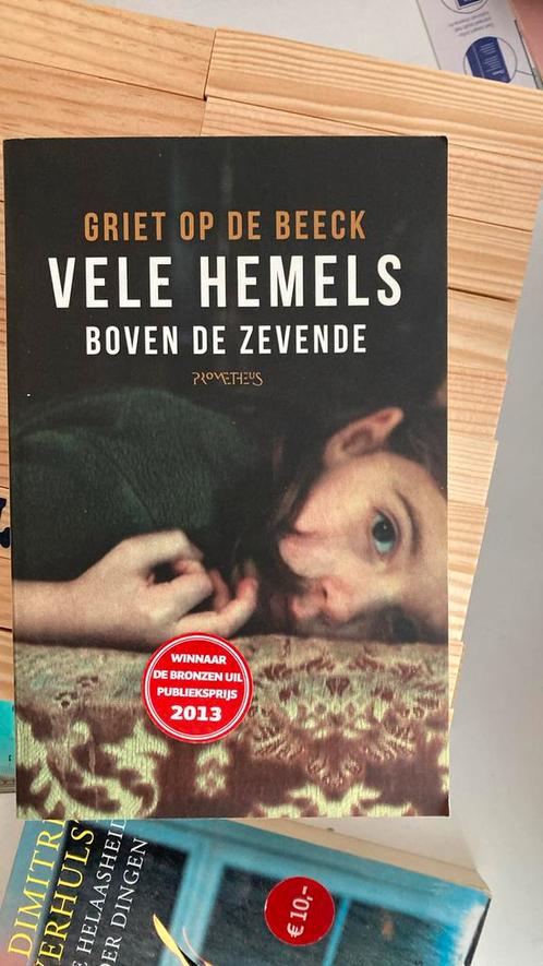 Griet op de Beeck - Vele hemels boven de zevende, Boeken, Literatuur, Zo goed als nieuw, Ophalen of Verzenden