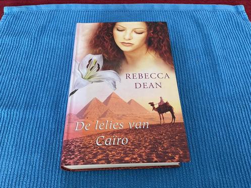 Rebecca Dean - De lelies van Caïro - ISBN9789047508830, Boeken, Romans, Gelezen, Amerika, Ophalen of Verzenden