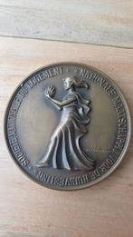 Bronzen munt 50 jarig bestaan nat. huisvestingmaatschappij, Postzegels en Munten, Penningen en Medailles, Ophalen of Verzenden