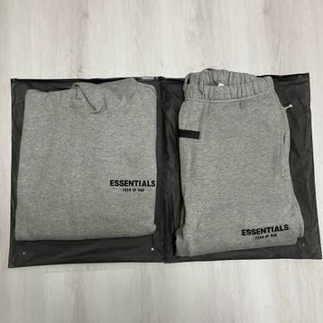 Essentials Trainingspak Dark Heather Oatmeal beschikbaar voor biedingen