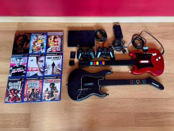 PlayStation 2 Slim + controllers + Guitar Hero controllers beschikbaar voor biedingen