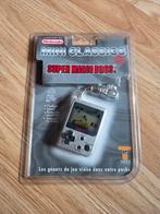 Super Mario sleutelhanger en spel., Ophalen of Verzenden, Zo goed als nieuw