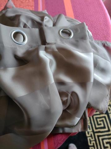 Transparante grijze gordijnen..  beschikbaar voor biedingen