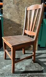 20 houten stoelen, Ophalen