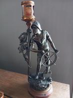 Antieke bronzen beeld (lamp), Ophalen