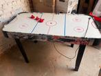 Airhockey tafel, Ophalen