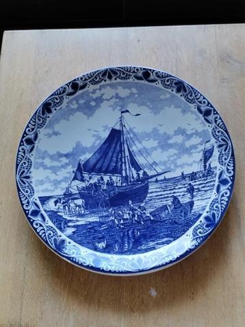blauw delfts bord beschikbaar voor biedingen