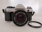 Canon AE1Program Camera met 50mm 1:2 lens en Canon Filter, Audio, Tv en Foto, Ophalen of Verzenden, Zo goed als nieuw, Spiegelreflex