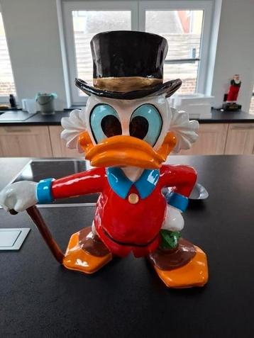 Vente statuette Picsou beschikbaar voor biedingen