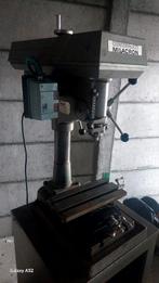 Freesbank kolomboormachine milacron, Ophalen
