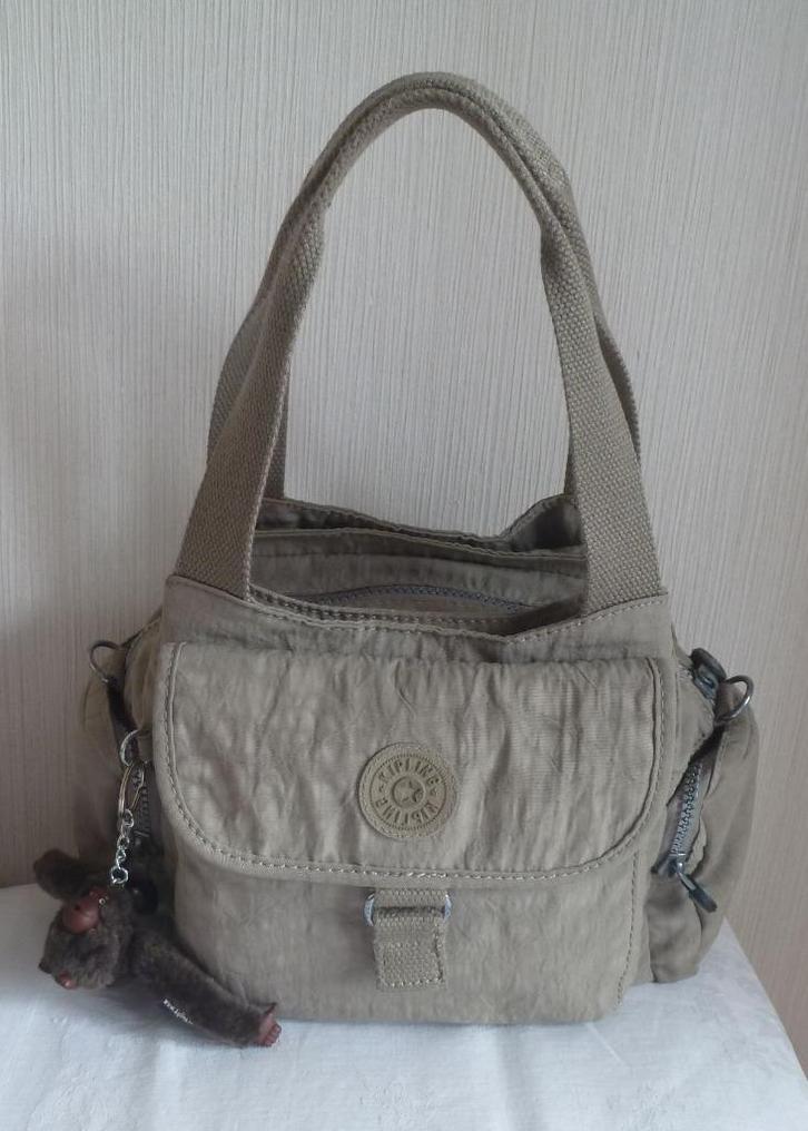 Kipling met beige handtas of schouder + aap, Handtassen en Accessoires, Tassen | Damestassen, Gebruikt, Handtas, Beige, Ophalen of Verzenden