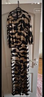Jumpsuit k-design maat medium, Ophalen of Verzenden, Zo goed als nieuw