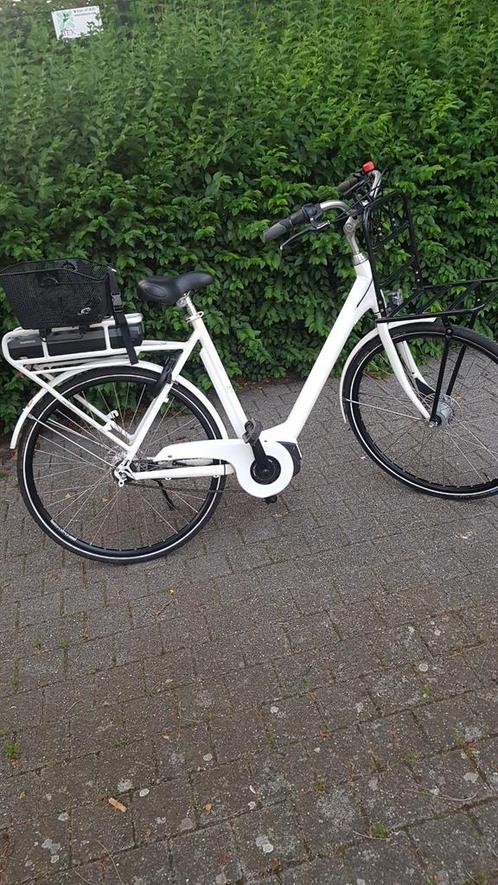 Zeer goed en proper elektrische fiets met middenmotor, Fietsen en Brommers, Elektrische fietsen, Zo goed als nieuw, Ophalen of Verzenden